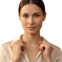 AMOR unisex pendant, 375 white gold, worn by model
