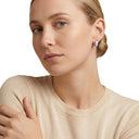 AMOR women's hoop earrings, stainless steel, worn by model
