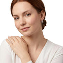 AMOR unisex hoop earrings, rhodium-plated 925 sterling silver, worn by model