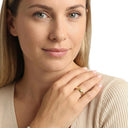 AMOR unisex ring, stainless steel with gold IP plating, worn by model