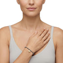AMOR women's bracelet, stainless steel with silver and gold IP plating, grey, worn by model