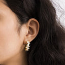 NOELANI women's hoop earrings, gold-plated 925 sterling silver, worn by model
