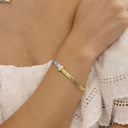 AMOR women's bracelet, stainless steel with silver and gold IP plating, worn by model