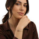 AMOR women's bracelet, stainless steel with silver and gold IP plating, worn by model