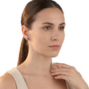 Women's stud earrings, worn by model