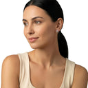 Women's stud earrings, worn by model