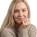 AMOR unisex ring, stainless steel with rose gold IP plating, worn by model