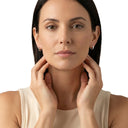 AMOR unisex hoop earrings, rhodium-plated 925 sterling silver, worn by model